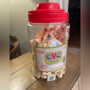 Kids learning toy - tub of connectable letters.